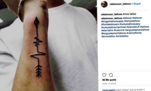 Un tatuaggio a freccia per il tuo braccio